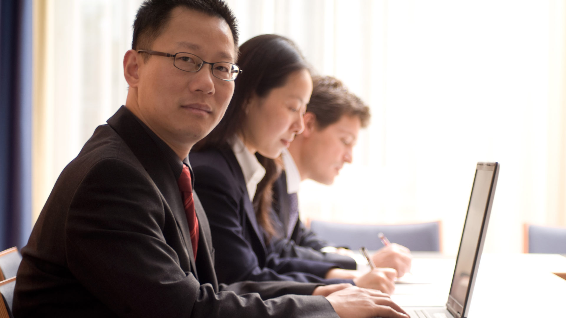 Businessman Series International group of Business people in a meeting.