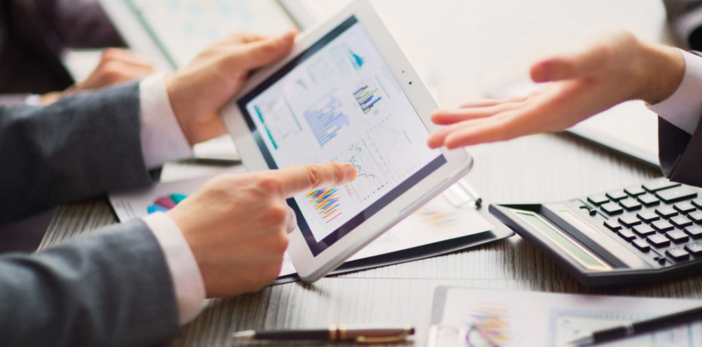 Businessman on online Financial Assessment. Team work in office Businessman on online Financial Assessment. Team work in the office